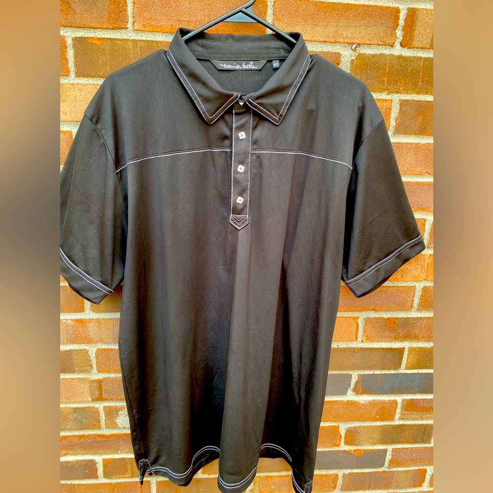 Travis Mathew XL Black with White stitching golf shirt 100% Polyester.